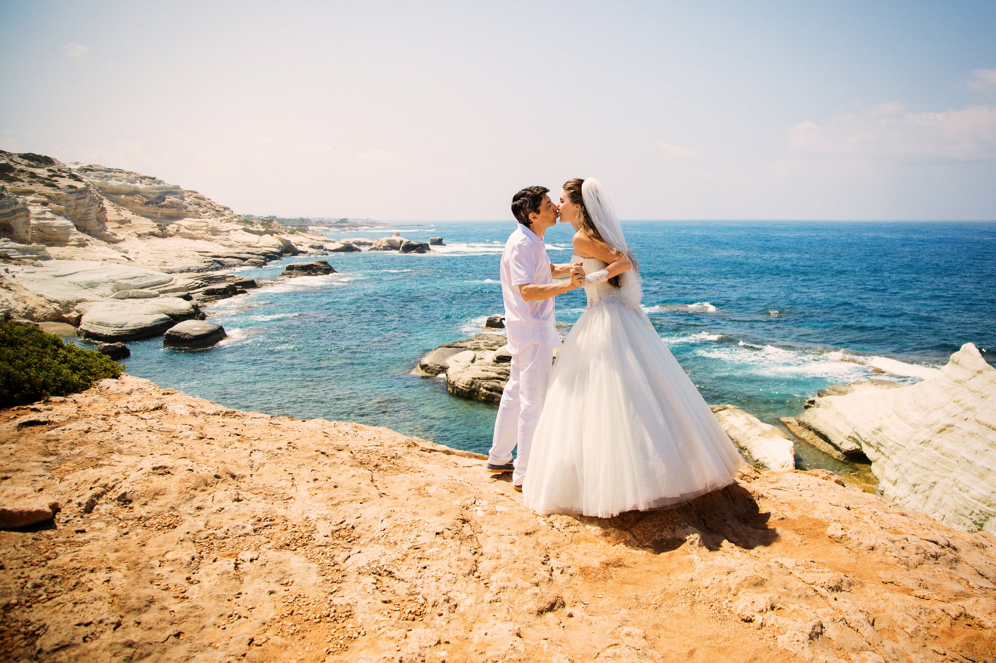 The Perfect Beach Wedding Dresses (And Effortless Styling Tips!)