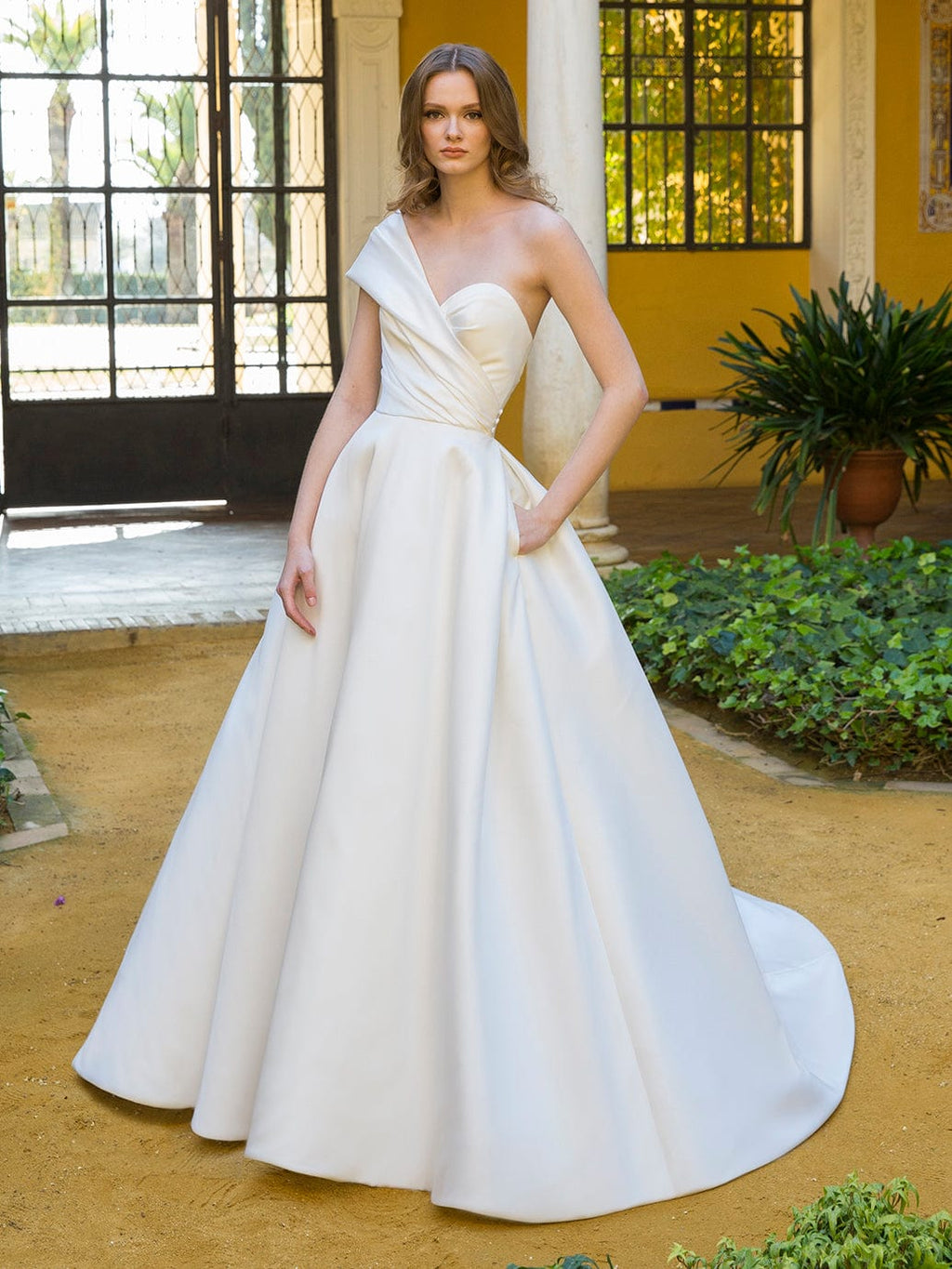 Strapless Fit And Flare Wedding Dress With Beaded Bodice And Front Slit